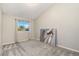 Bedroom offering a bright window and carpet floors at 2954 E 101St Ave, Thornton, CO 80229