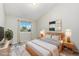 Bedroom with carpet and a modern, minimalist aesthetic at 2954 E 101St Ave, Thornton, CO 80229
