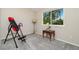 Spare bedroom offering a bright window and neutral walls at 2954 E 101St Ave, Thornton, CO 80229