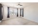 Spacious bedroom with natural light streaming through windows and simple, stylish decor at 4672 Basalt Ridge Cir, Castle Rock, CO 80108
