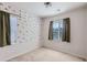 Neutral bedroom with carpet and window is ready for personalization at 4672 Basalt Ridge Cir, Castle Rock, CO 80108