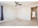Spacious bedroom with carpet and ceiling fan needs some TLC at 4672 Basalt Ridge Cir, Castle Rock, CO 80108