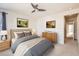 Cozy bedroom with tufted headboard and two dressers offers ample storage at 4672 Basalt Ridge Cir, Castle Rock, CO 80108