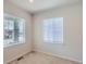 Cozy bedroom bathed in natural light with neutral walls and plush carpeting at 4672 Basalt Ridge Cir, Castle Rock, CO 80108