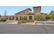 Attractive community clubhouse with stone and wood facade and accessible parking at 4672 Basalt Ridge Cir, Castle Rock, CO 80108