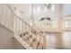 Bright and airy living room with soaring ceilings and expansive windows with view of neighborhood at 4672 Basalt Ridge Cir, Castle Rock, CO 80108