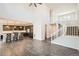 Open floor plan with views of the kitchen and staircase, perfect for modern living and entertaining at 4672 Basalt Ridge Cir, Castle Rock, CO 80108