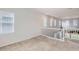 Bright loft area with staircase, large windows, and modern railing at 4672 Basalt Ridge Cir, Castle Rock, CO 80108