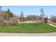 Community playground with slide and climbing structure surrounded by a grassy area at 4672 Basalt Ridge Cir, Castle Rock, CO 80108
