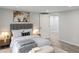 Serene bedroom with soft lighting, neutral decor, and a plush bed with stylish accents at 1345 Holly St, Denver, CO 80220