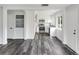 Modern kitchen featuring stainless steel appliances, white cabinetry, and sleek countertops at 1345 Holly St, Denver, CO 80220