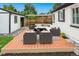Well-appointed patio with comfortable seating area perfect for outdoor lounging and entertaining guests at 1345 Holly St, Denver, CO 80220