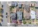 Aerial view of homes showing neat lawns and tree-lined streets in a well-maintained neighborhood at 3311 N York St, Denver, CO 80205