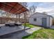 Outdoor space featuring a covered patio with comfortable seating and a shed at 3311 N York St, Denver, CO 80205