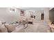 Finished basement Gathering room with carpet, egress window and finished staircase at 3311 N York St, Denver, CO 80205