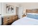 Comfortable bedroom with wood furniture and calming decor, providing a serene atmosphere at 3311 N York St, Denver, CO 80205