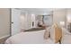 Finished bedroom featuring a view to finished ensuite bathroom and reading nook at 3311 N York St, Denver, CO 80205