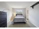 Bright bedroom featuring neutral tones, a comfortable bed, and great natural light at 1474 S Uinta Ct, Denver, CO 80231