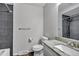 Updated bathroom with a modern vanity, stylish gray tiling, and shower at 8905 Field St # 91, Westminster, CO 80021