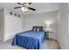 Serene bedroom with a plush bed, soft carpet, and closet with ample storage space at 8905 Field St # 91, Westminster, CO 80021
