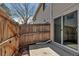 Fenced backyard patio with ample space for outdoor seating and entertaining at 8905 Field St # 91, Westminster, CO 80021