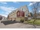 Street view of two-story townhomes showcasing attached garages and a well-kept facade at 1479 Nemrick Pl, Castle Rock, CO 80109