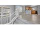 Open concept living room offers stairs leading to the second floor and tiled flooring at 1479 Nemrick Pl, Castle Rock, CO 80109