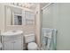 Well-maintained bathroom featuring a vanity, toilet, and walk-in shower at 6452 Freeport Dr, Highlands Ranch, CO 80130