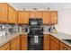 Well-organized kitchen with stainless steel appliances, updated countertops, and a stylish backsplash at 6452 Freeport Dr, Highlands Ranch, CO 80130