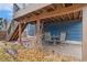 Cozy outdoor patio area with seating, perfect for relaxing or entertaining at 6452 Freeport Dr, Highlands Ranch, CO 80130