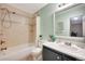 Clean and functional bathroom with a shower-tub combo and vanity, offering a refreshing space at 4110 Hale Parkway Pkwy # 3J, Denver, CO 80220