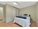 Inviting bedroom features a comfortable bed, ample closet space, and soft, natural light at 4110 Hale Parkway Pkwy # 3J, Denver, CO 80220