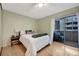 Relaxing bedroom with a king bed and sliding door to the balcony, creating a serene retreat at 4110 Hale Parkway Pkwy # 3J, Denver, CO 80220