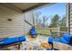 Relaxing outdoor balcony with comfortable seating and views of the lush green landscape at 3260 47Th St # 108A, Boulder, CO 80301