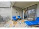Cozy patio area complete with stylish outdoor seating and a clear view of the lush greenery at 3260 47Th St # 108A, Boulder, CO 80301