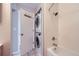 Bathroom with a tub/shower combo and convenient in-unit washer and dryer at 3260 47Th St # 108A, Boulder, CO 80301