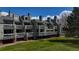 Spacious exterior of the building with lawn and balconies at 3260 47Th St # 108A, Boulder, CO 80301