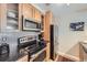 Well-equipped kitchen with stainless steel appliances and granite countertops offering ample space at 3260 47Th St # 108A, Boulder, CO 80301