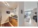 Galley kitchen boasts stainless steel appliances, granite counters, and convenient access to living area at 3260 47Th St # 108A, Boulder, CO 80301