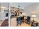 Modern kitchen featuring stainless steel appliances, breakfast bar seating, and sleek countertops at 3260 47Th St # 108A, Boulder, CO 80301