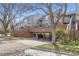 Covered parking with brick structure and address number at 3260 47Th St # 108A, Boulder, CO 80301