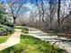 Walkway, green spaces and trees surrounding property at 3260 47Th St # 108A, Boulder, CO 80301