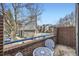 Patio area showing outdoor seating, privacy walls, and a view of a pool at 3260 47Th St # 108A, Boulder, CO 80301