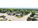 A well-maintained neighborhood with mature trees and green spaces at 7780 S Kendall Blvd, Littleton, CO 80128