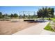 Well-maintained baseball field with bleachers and fenced perimeter for community sports and recreation at 7780 S Kendall Blvd, Littleton, CO 80128