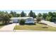 Charming single-story house with well-manicured front yard and beautiful landscaping at 7780 S Kendall Blvd, Littleton, CO 80128
