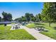 Outdoor picnic area with tables and benches, perfect for neighborhood gatherings and enjoying the outdoors at 7780 S Kendall Blvd, Littleton, CO 80128