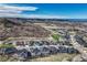 Wonderful aerial view of the community featuring well-manicured lawns and breathtaking mountain views at 815 Alumroot St, Castle Rock, CO 80104