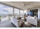 Comfortable covered deck with ample seating, providing a relaxing outdoor space to enjoy the beautiful panoramic views at 815 Alumroot St, Castle Rock, CO 80104