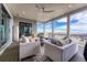 Cozy covered deck with comfortable seating and a stunning view, perfect for relaxing and entertaining guests at 815 Alumroot St, Castle Rock, CO 80104